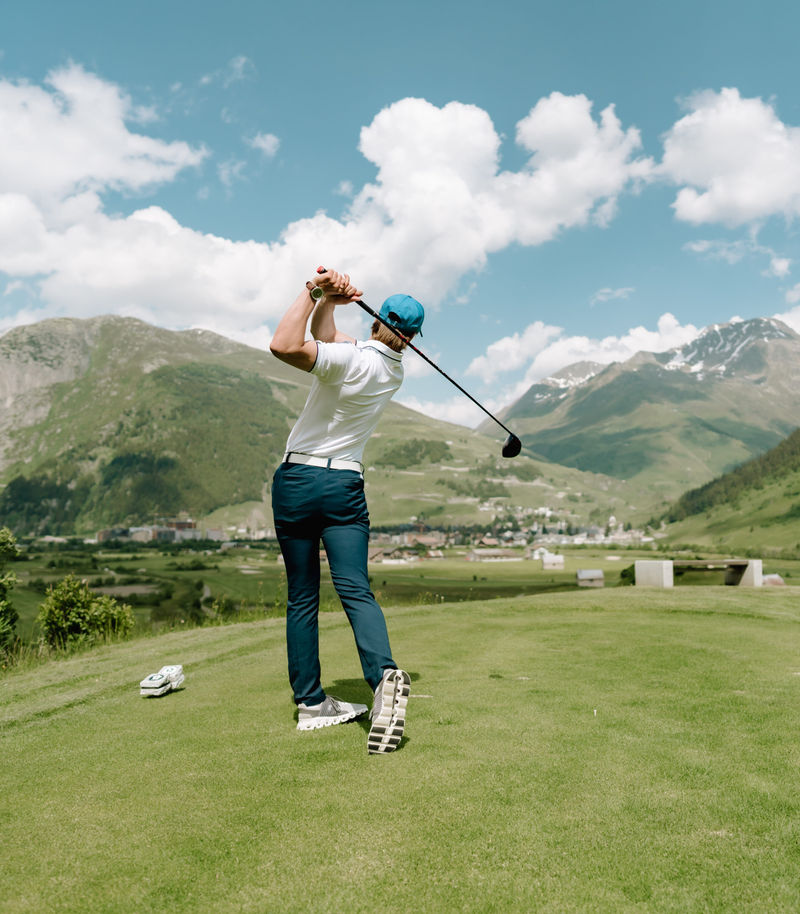 man golfing in Andermatt