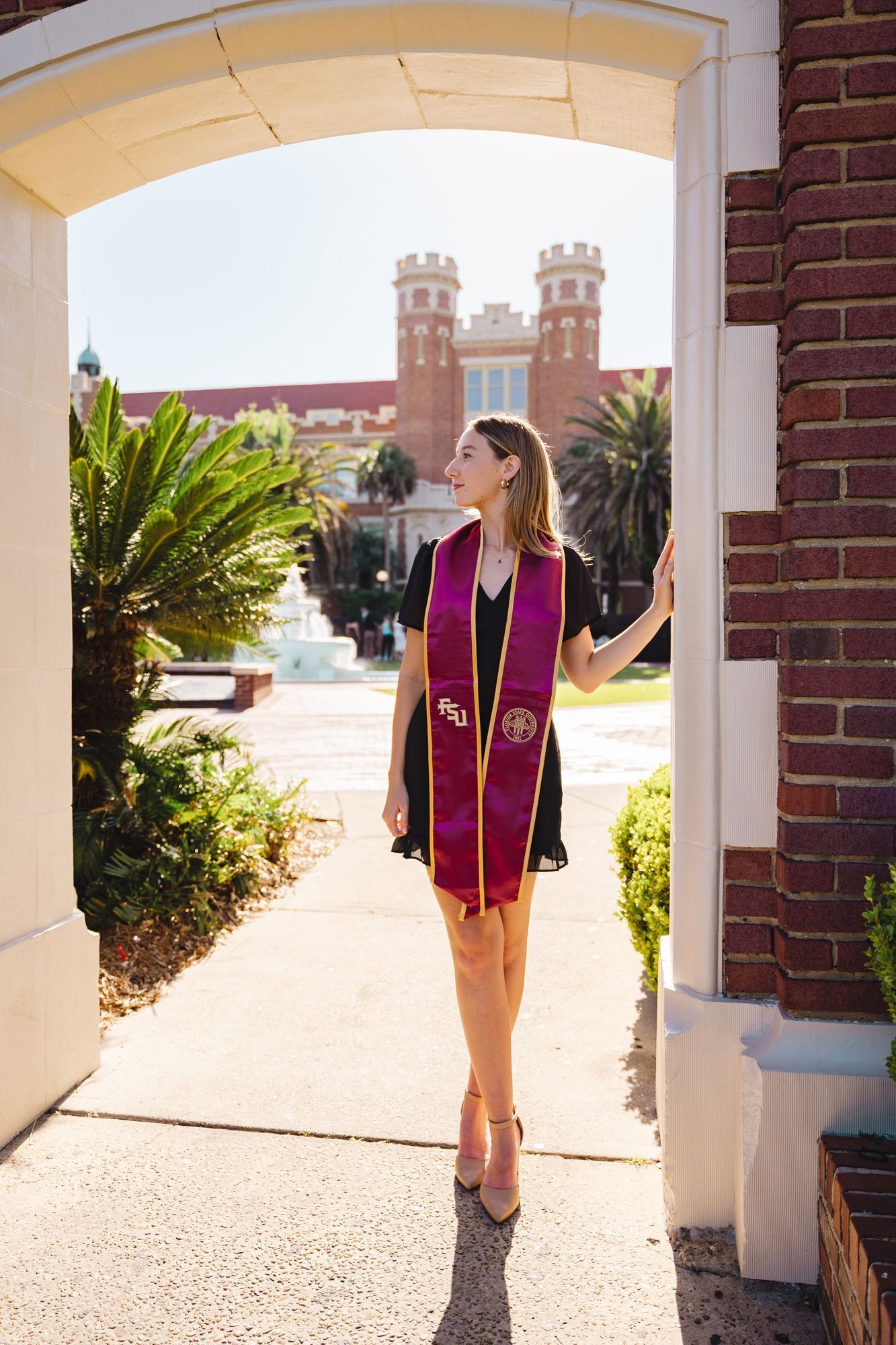 Graduation photo in the arch in front of Westcott Fountain