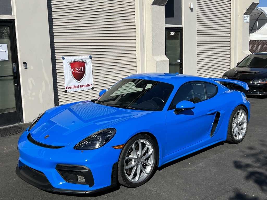 Professional car detailing service, Apollo Auto Spa, showcasing ceramic coatings and paint correction techniques.