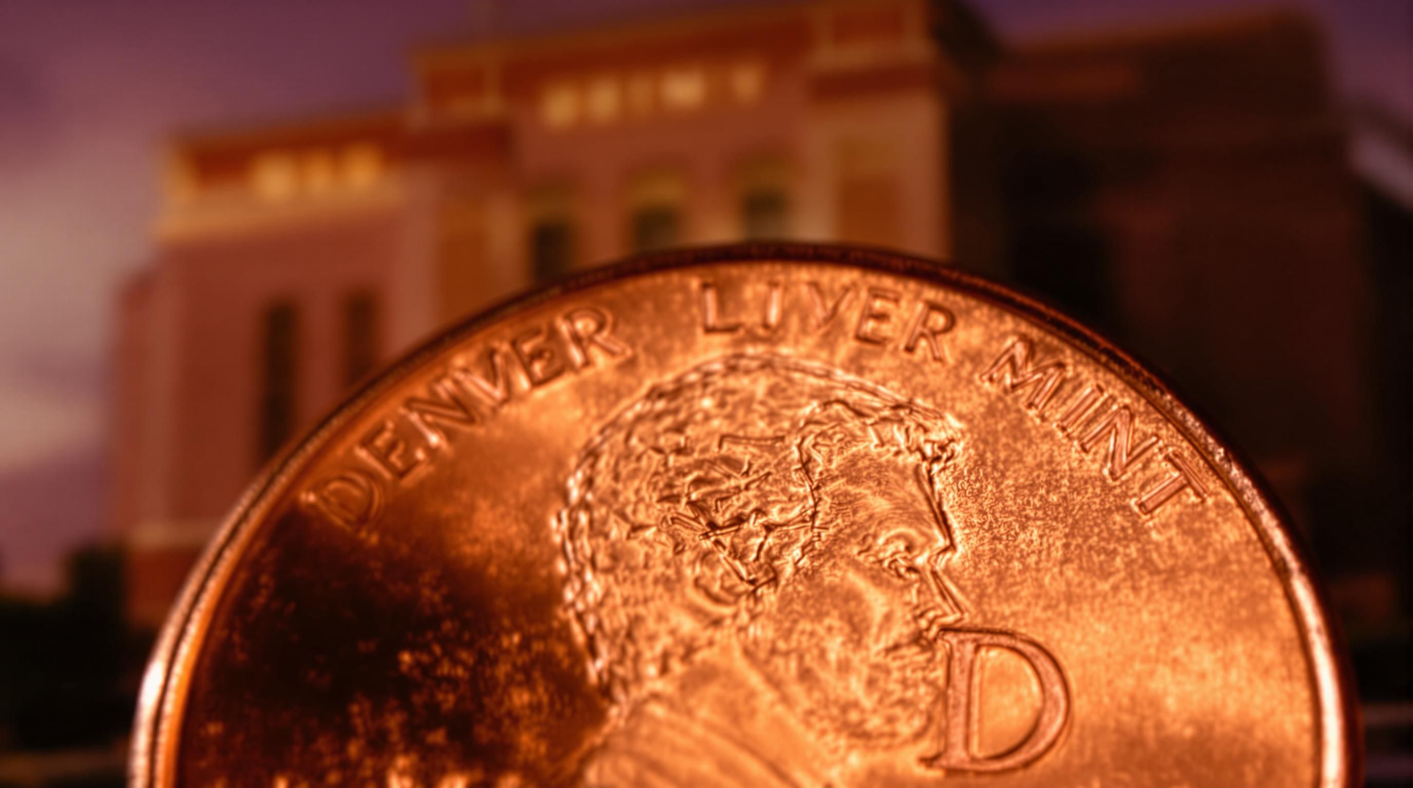 A close-up of a 1993-D penny showing the mint mark below the date