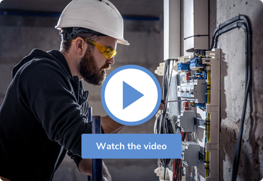 A photo of an electrician working on an electrical panel that, when clicked, leads to a video about Apptoto.