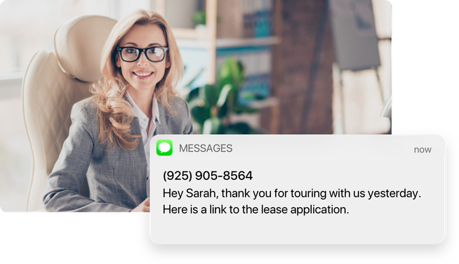 A property manager sits at her desk, sending a text message to her client that provides a link to a lease application.