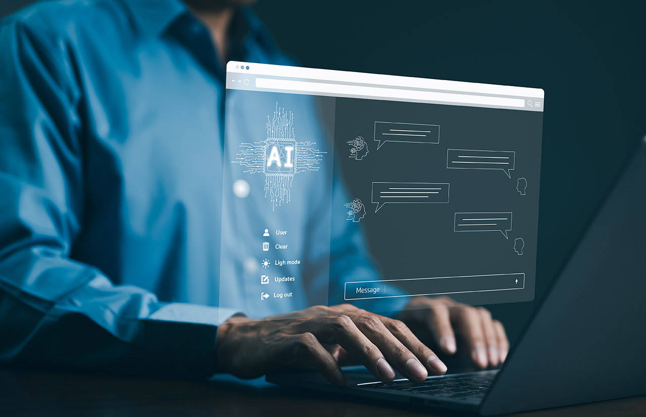 virtual image of man typing on laptop
