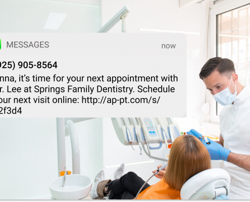 Dentist checking teeth of a patient with one dental appointment reminder text displayed.