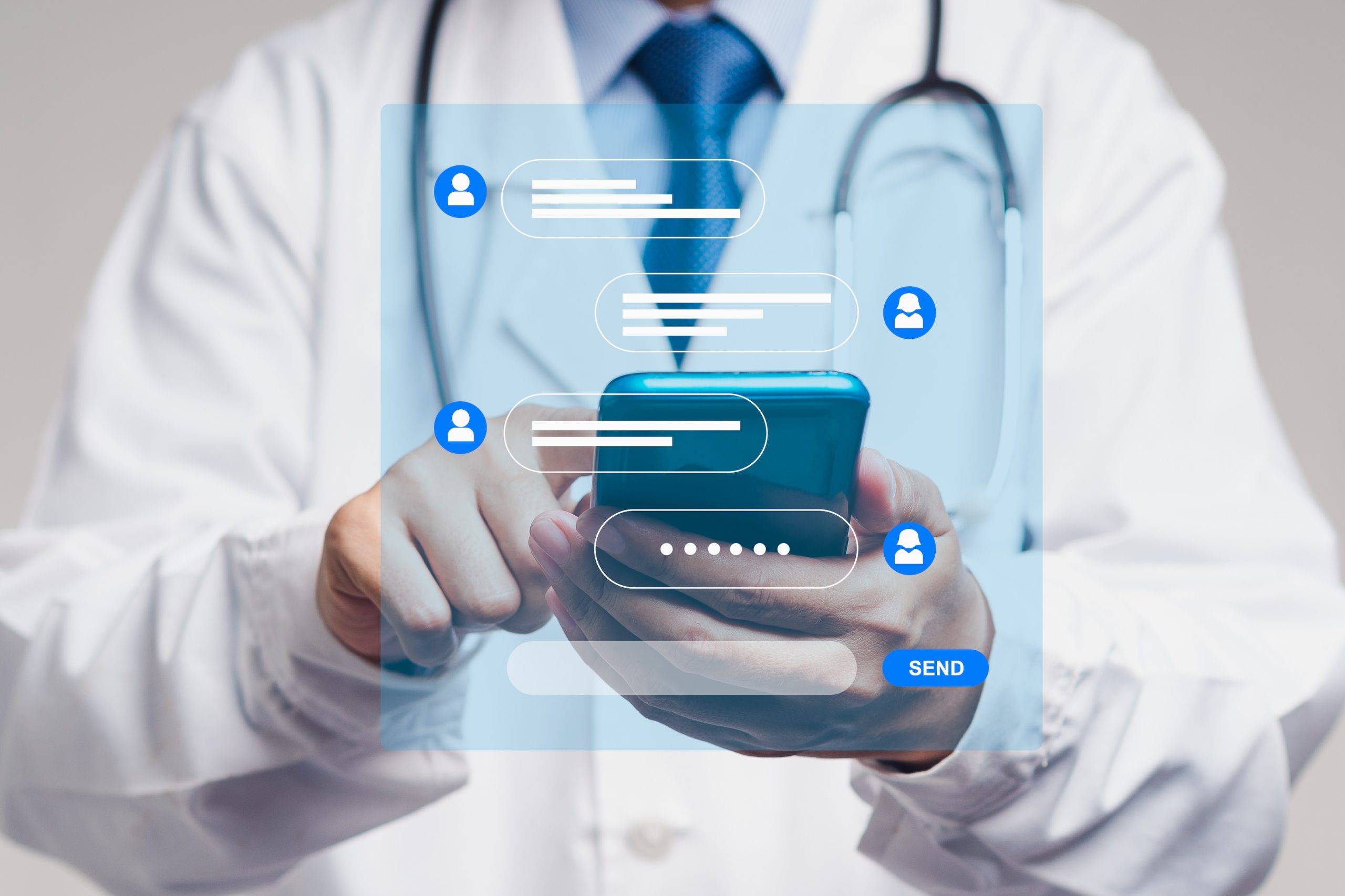 Doctor using patient appointment reminder software to chat with patient.