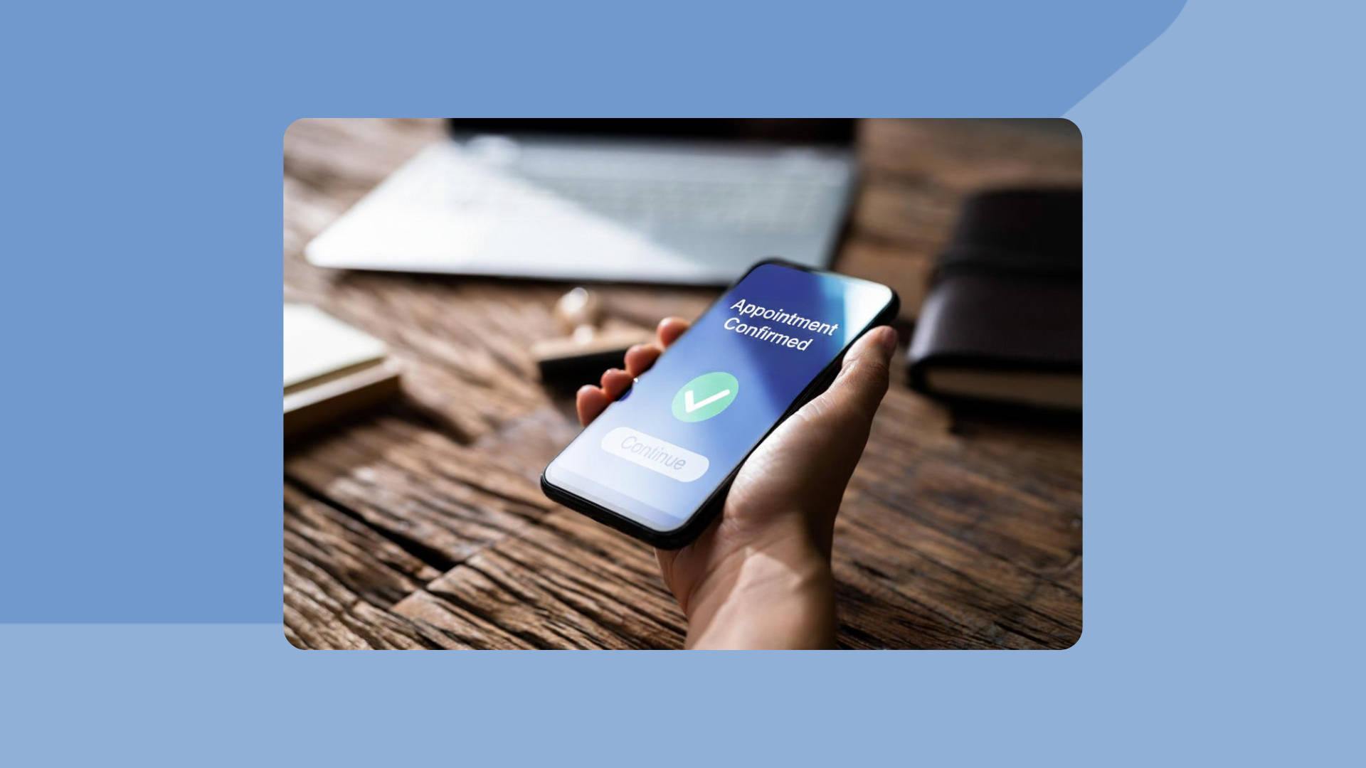 Cell phone showing client confirming appointment after text