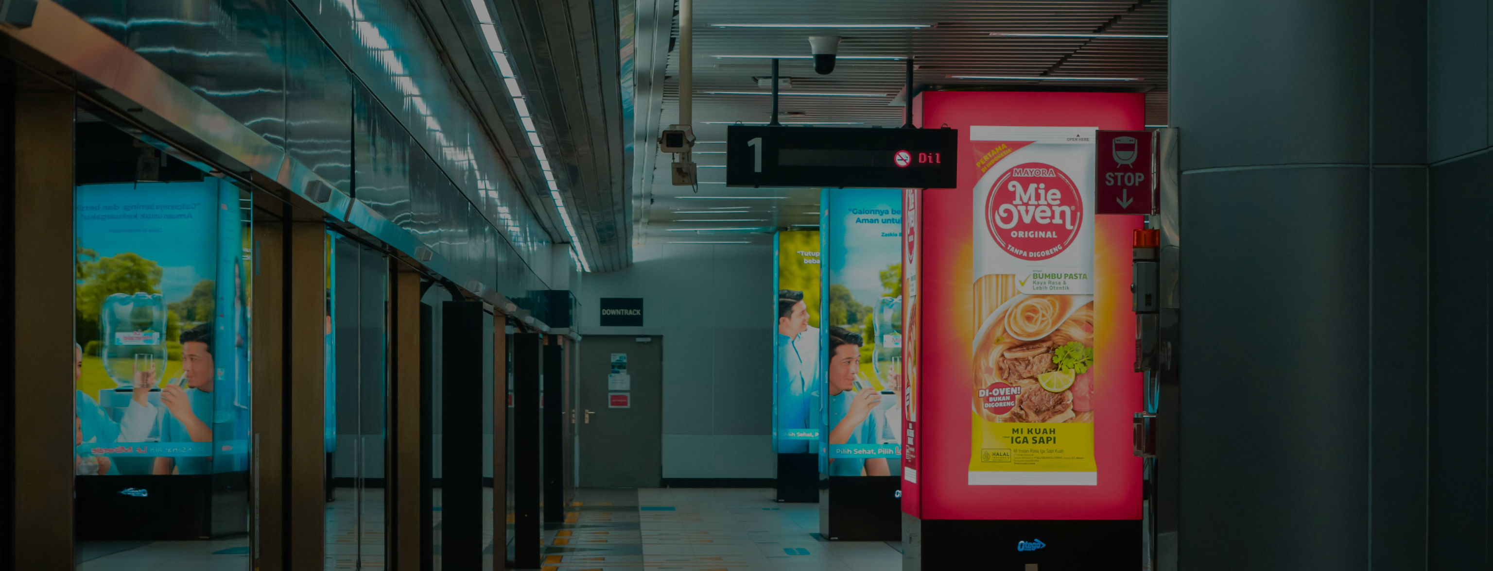 Multiple posters within a train station