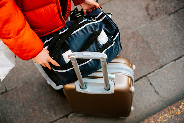 A rucksack sitting on top of luggage
