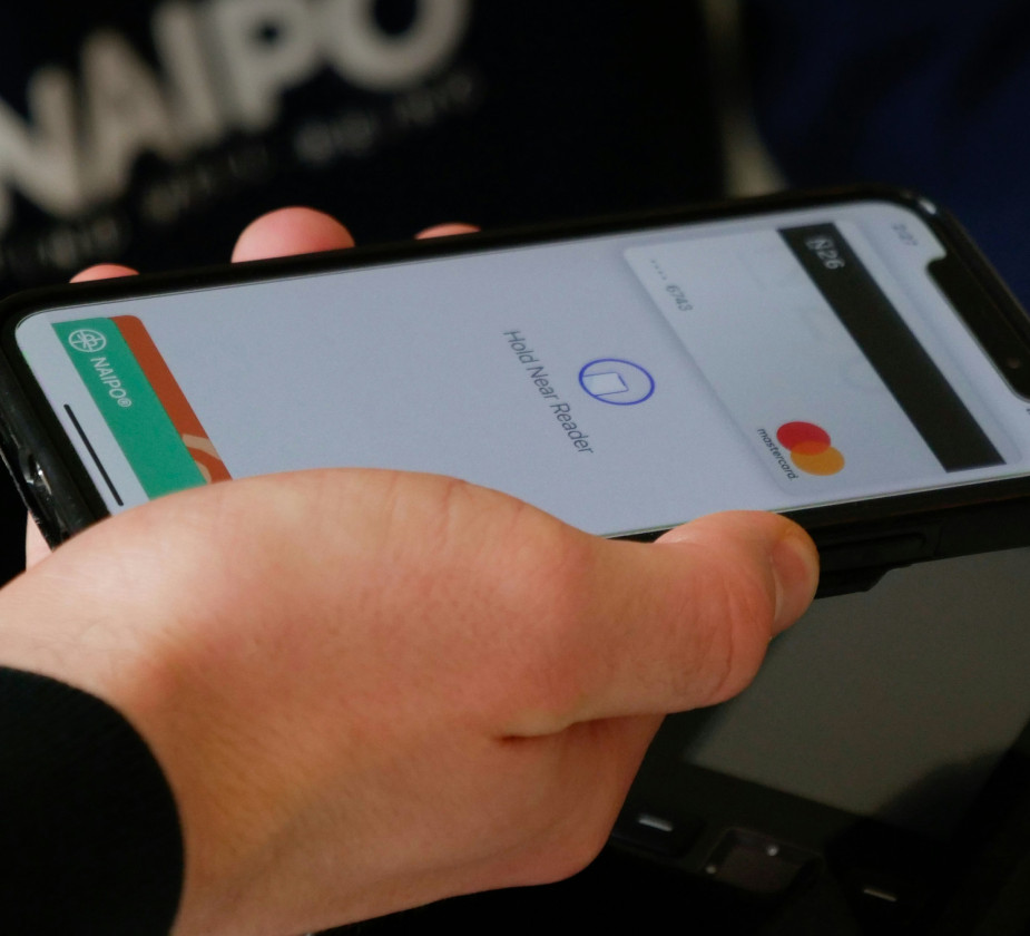 A mobile phone showing a bank card transaction screen