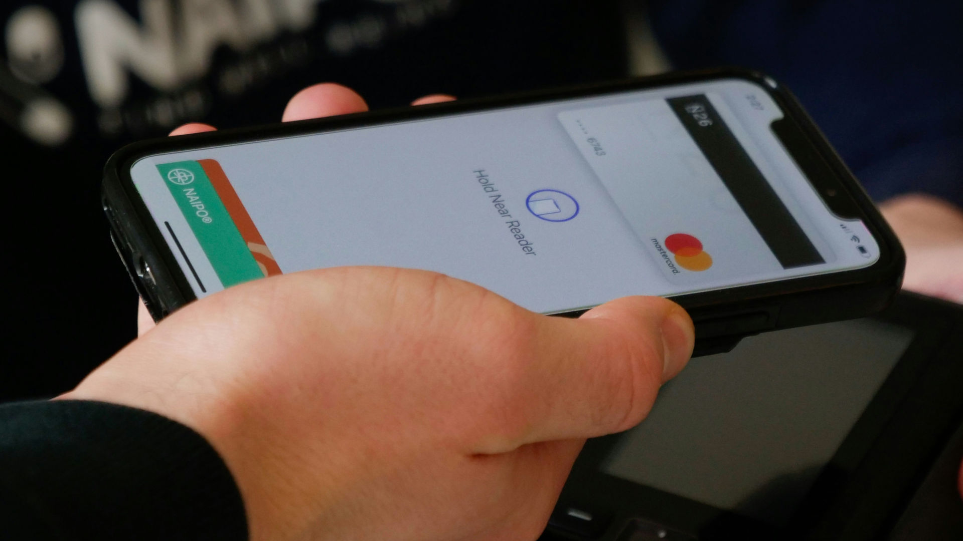 A mobile phone showing a bank card transaction screen