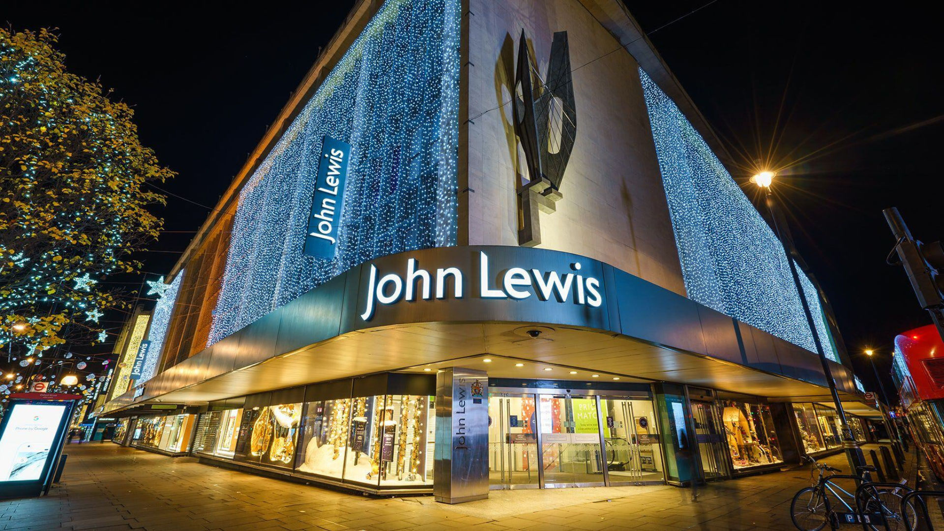 John Lewis department store is decorated with Christmas lights.