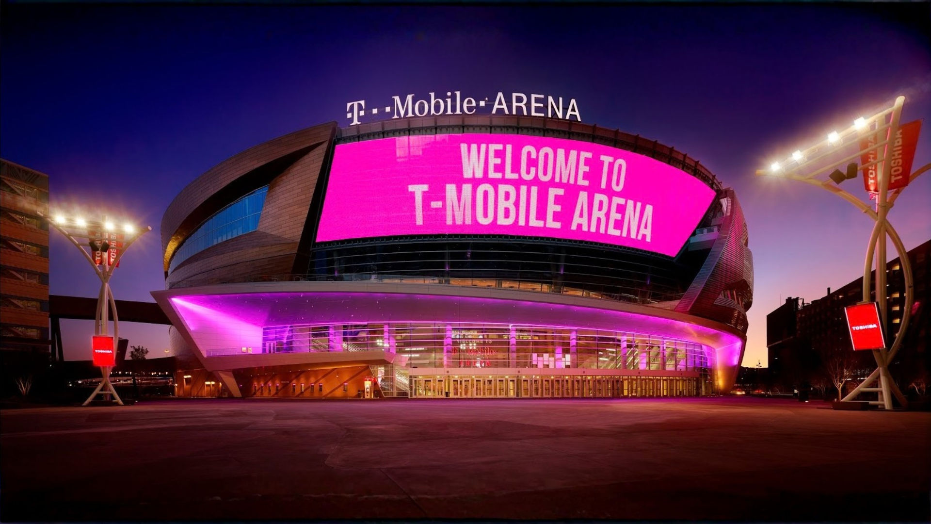 T-Mobile Arena with a bright, colourful LED display on the exterior.