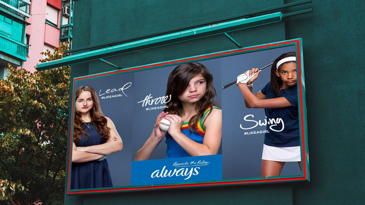Always ad featuring three girls in sports poses, with the hashtag "#LIKEAGIRL" and the phrases "Lead," "Throw," and "Swing" alongside the brand logo.