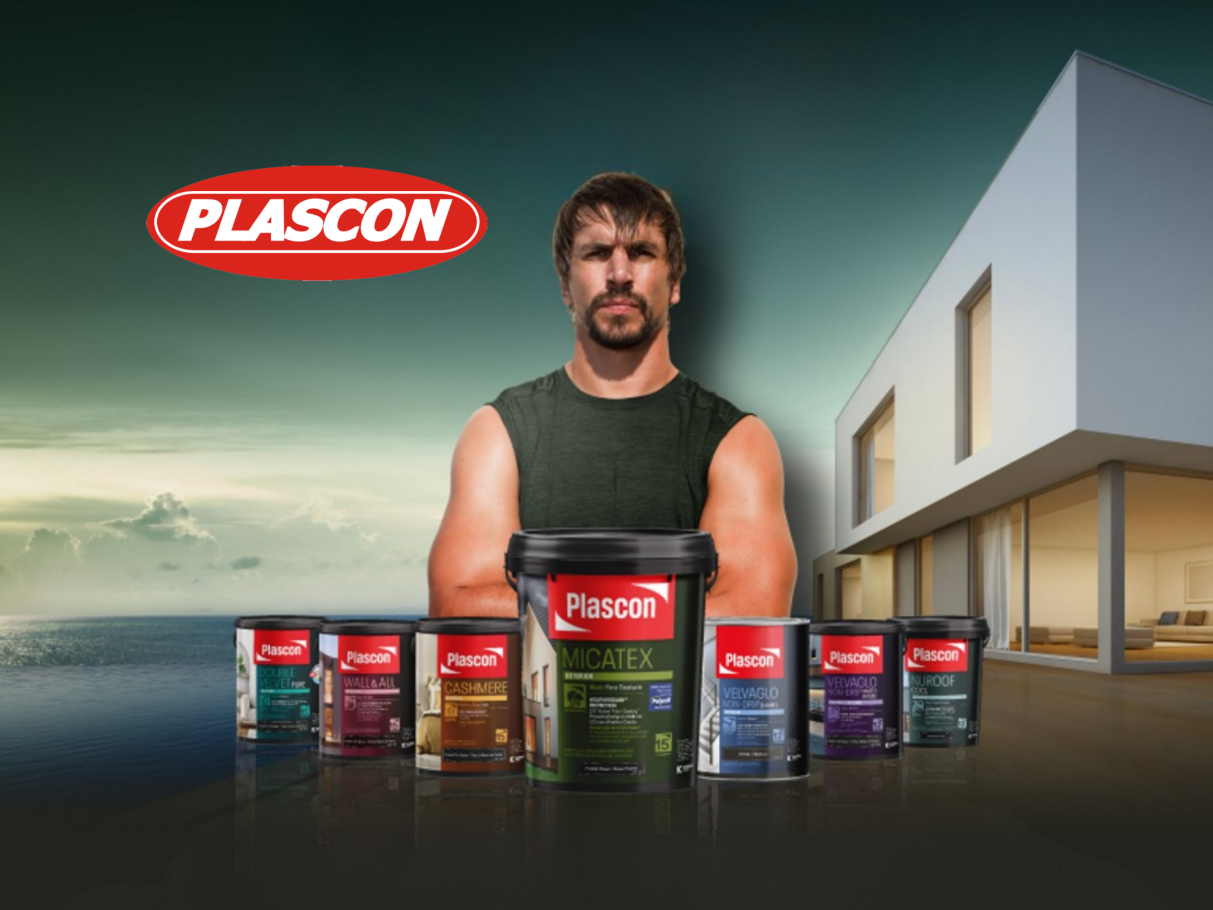 A muscular man wearing a sleeveless black shirt stands behind a row of Plascon paint cans