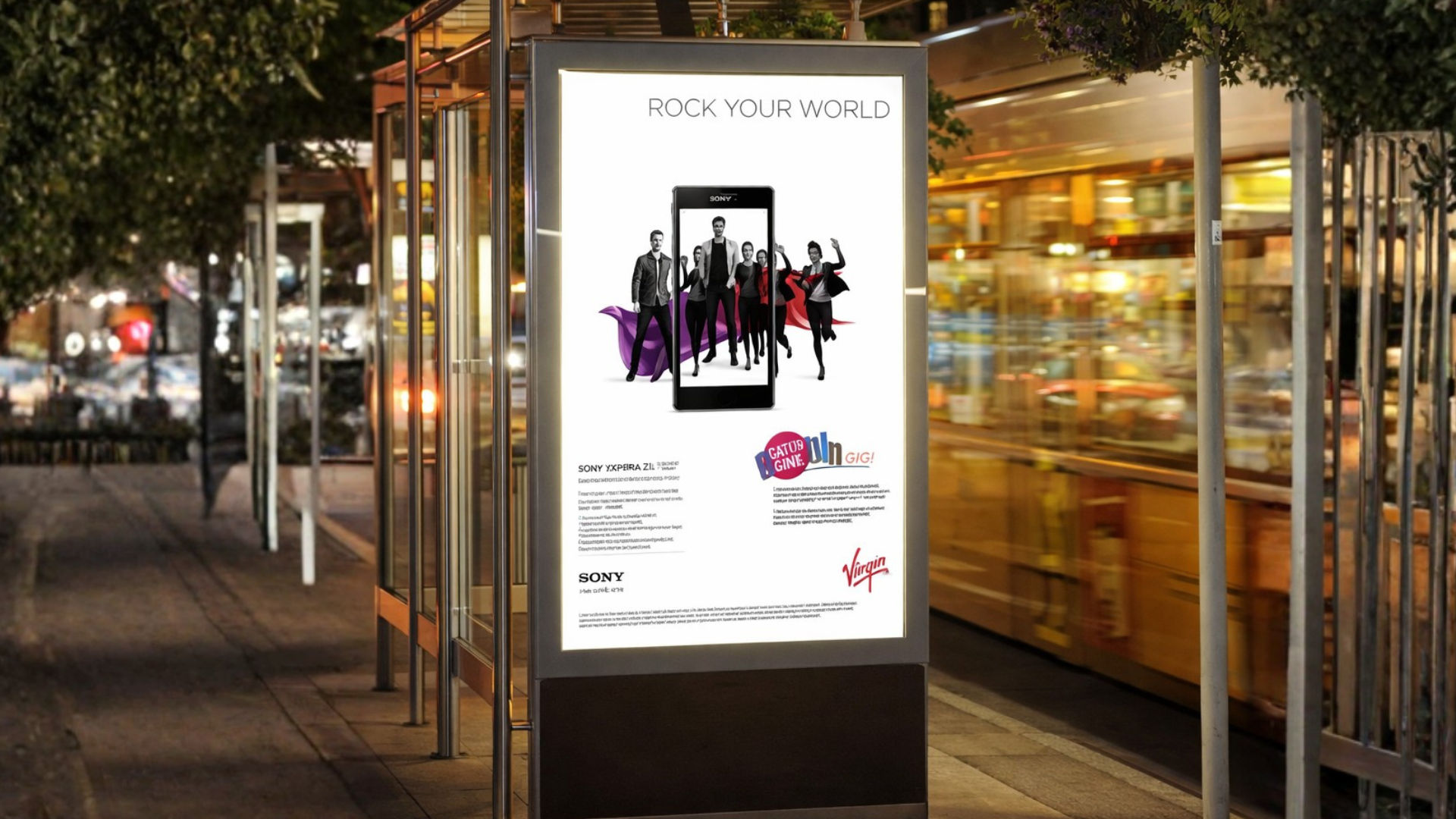  Eine Werbetafel mit der Moshtix-Band, gezeigt in einer urbanen Umgebung bei Nacht. 