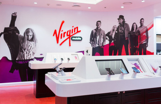 Foto eines Virgin Phone Stores mit einem Virgin-Mobile-Logo an der Wand und Promotionsbildern der Moshtix-Band.