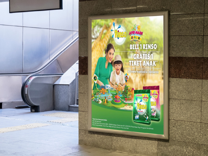 A Unilever Rinso campaign poster in an underground station
