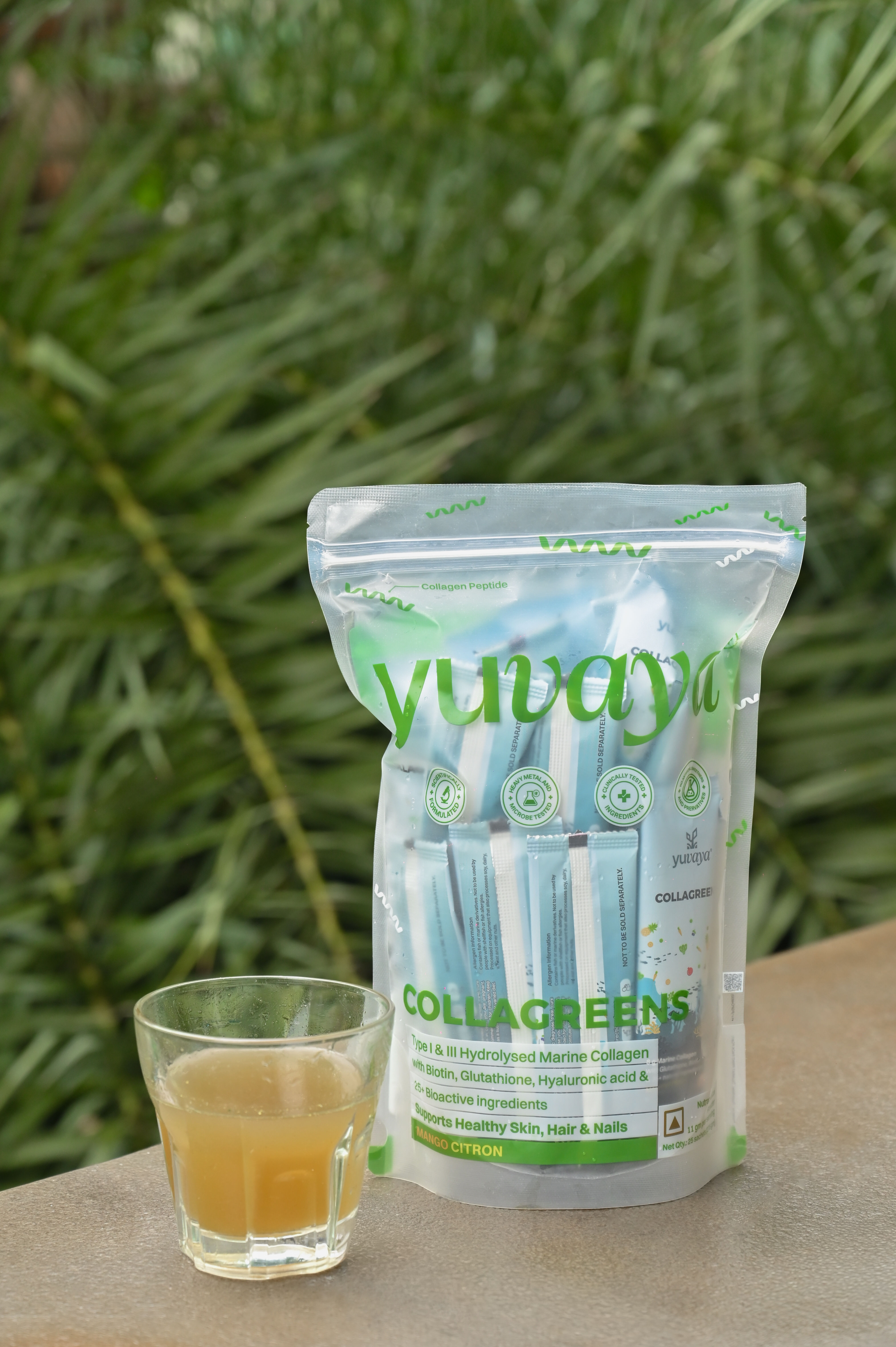 Yuvaya Collagreens with tropical backdrop