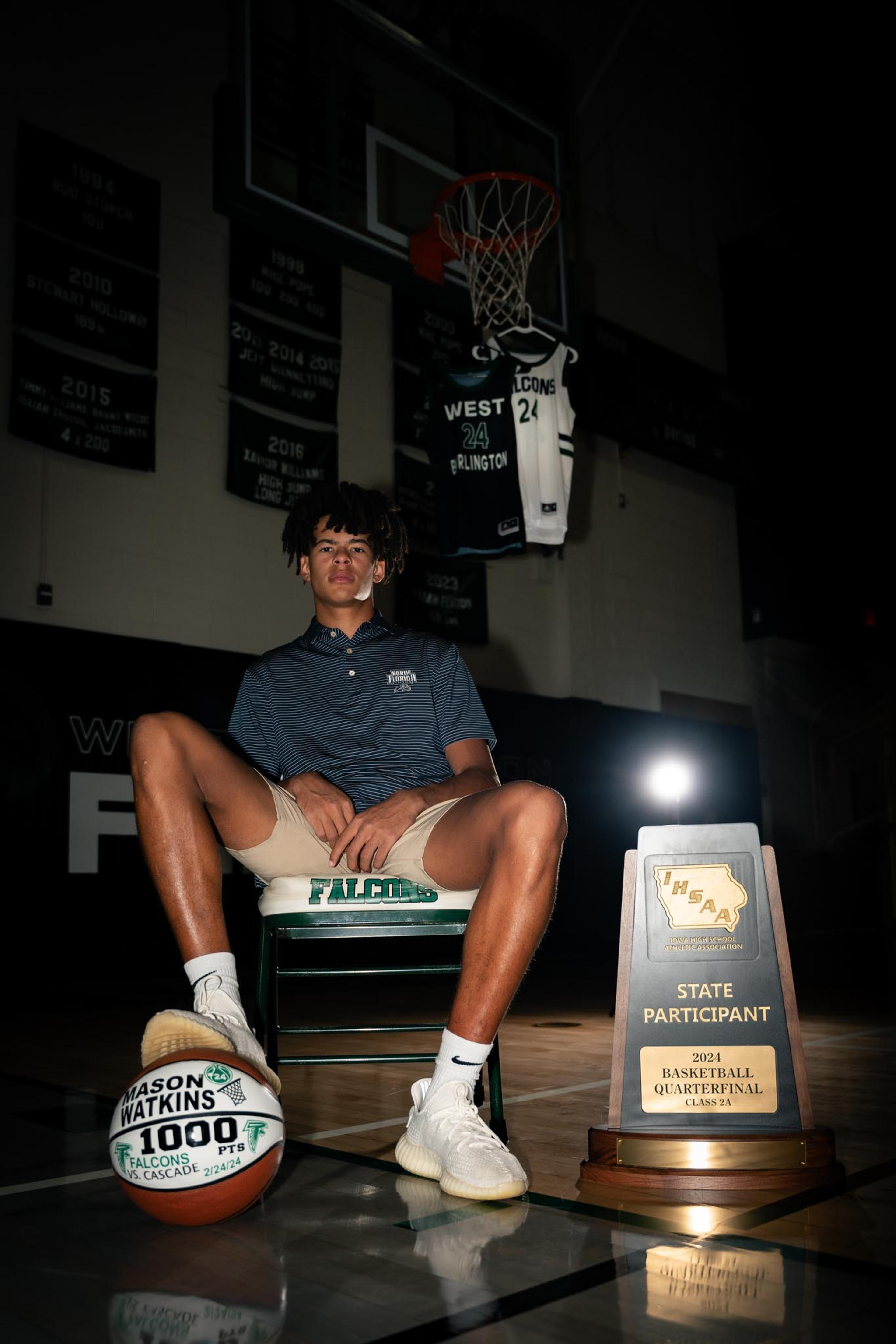 Portrait in a gym with a trophy