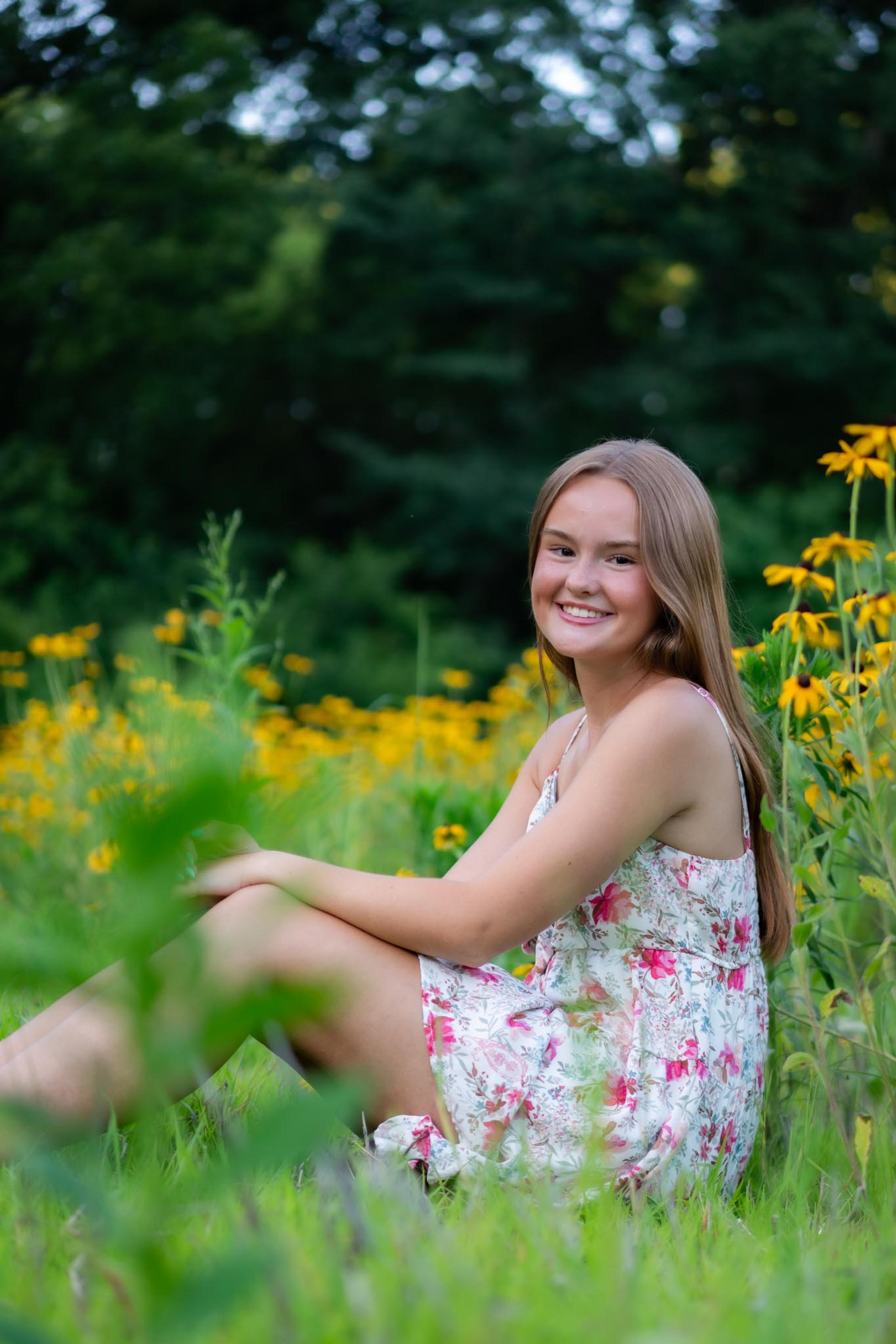 Portrait in a flower field, subject in a dress
