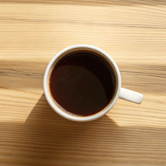 Traditional spiced chai served in a white mug.