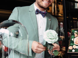 Atteline PR - Forever Rose founder with a white rose
