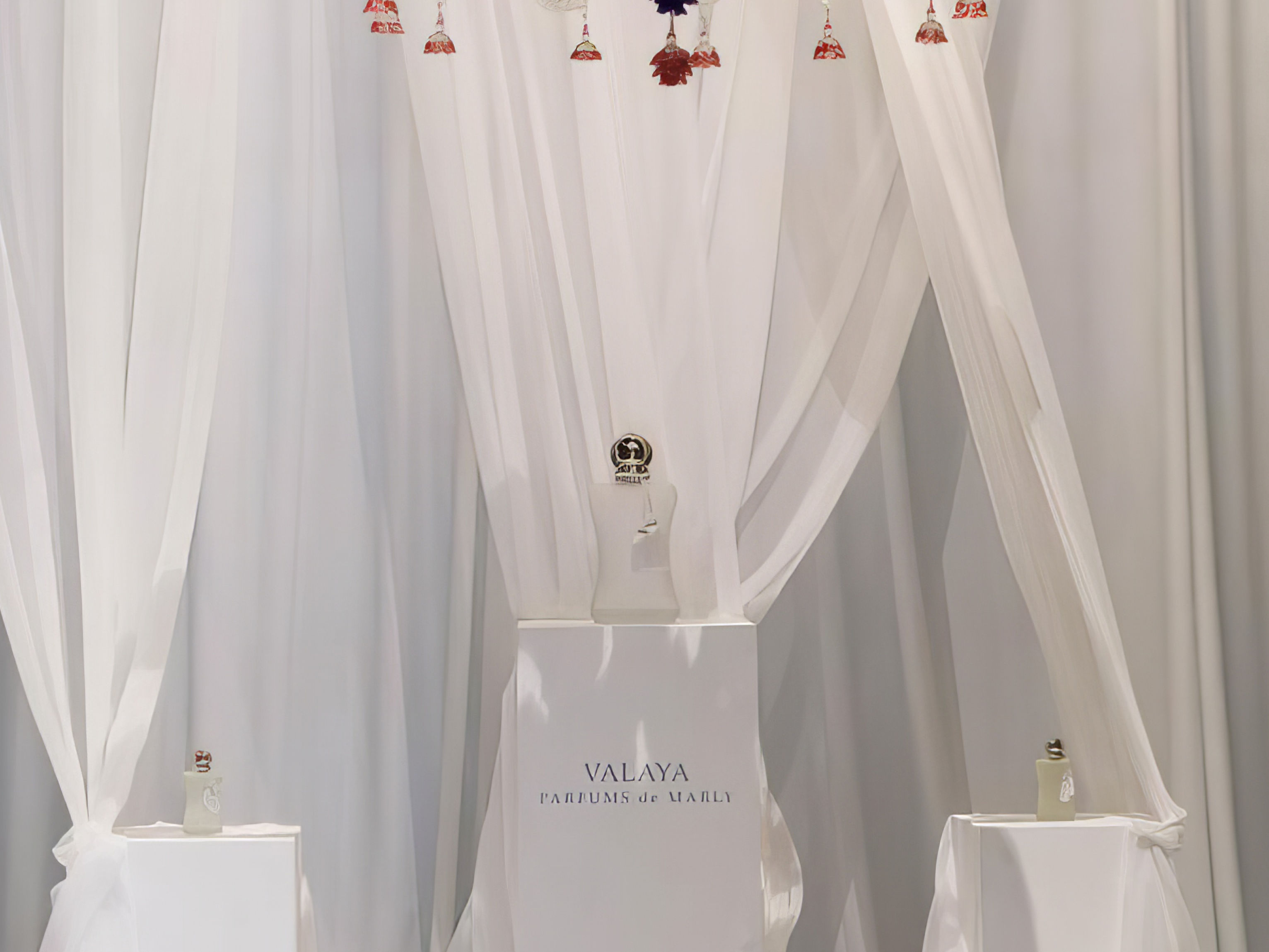 Atteline - Parfum De Marly Valaya event with a beautiful perfume setup.