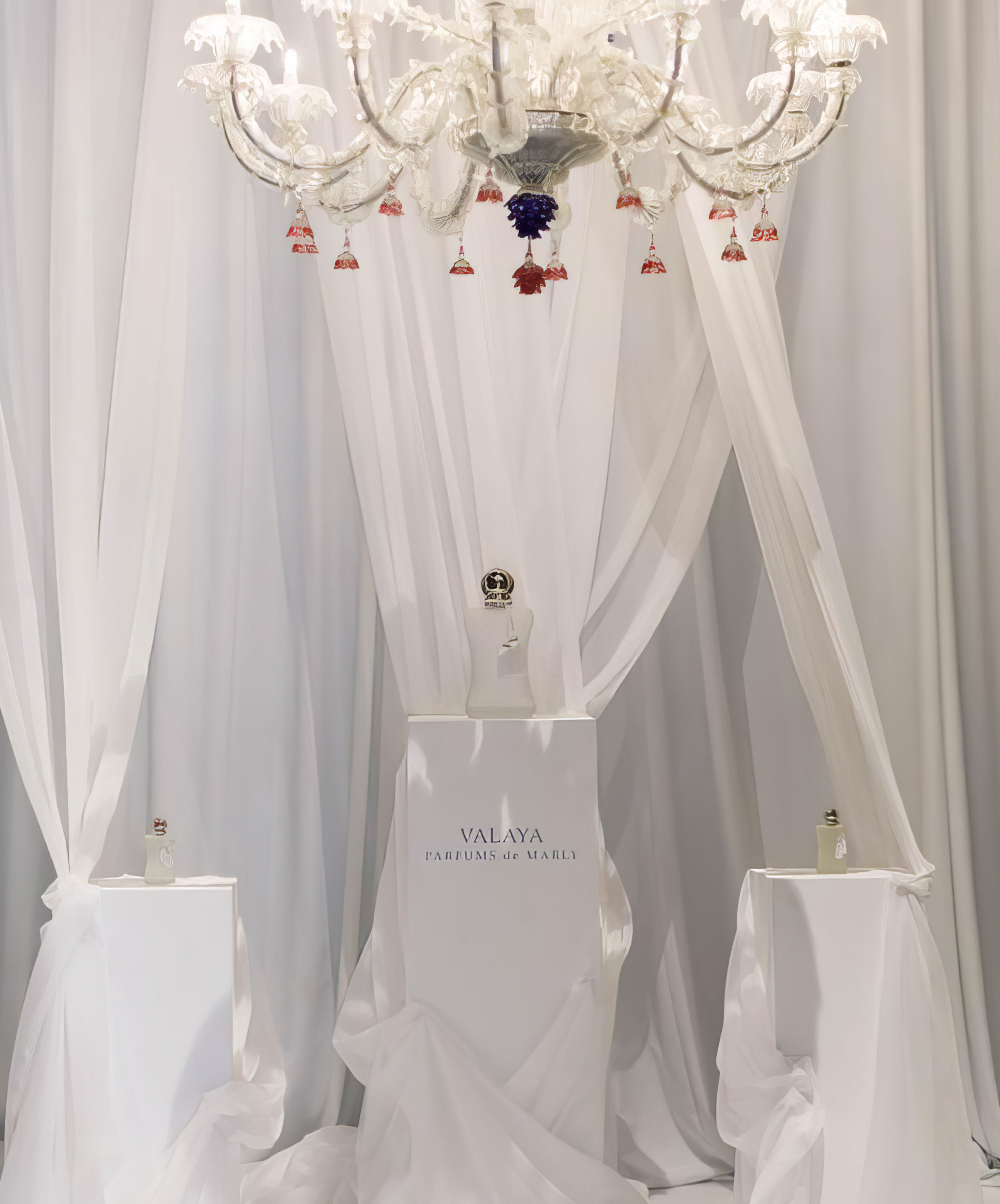 Atteline - Parfum De Marly Valaya event with a beautiful perfume setup.