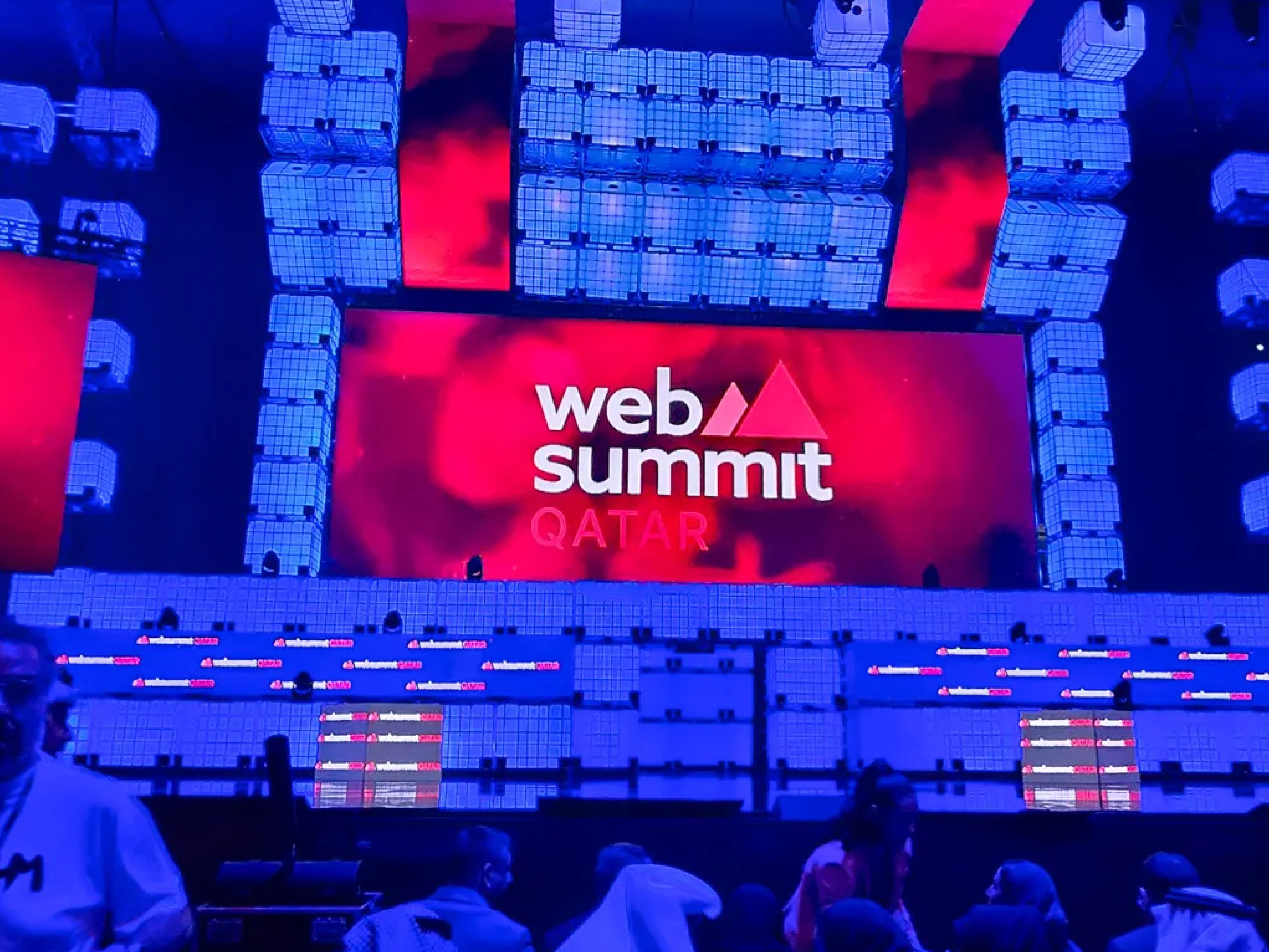 Atteline - Web Summit Qatar 2024 events stage with some attendees
