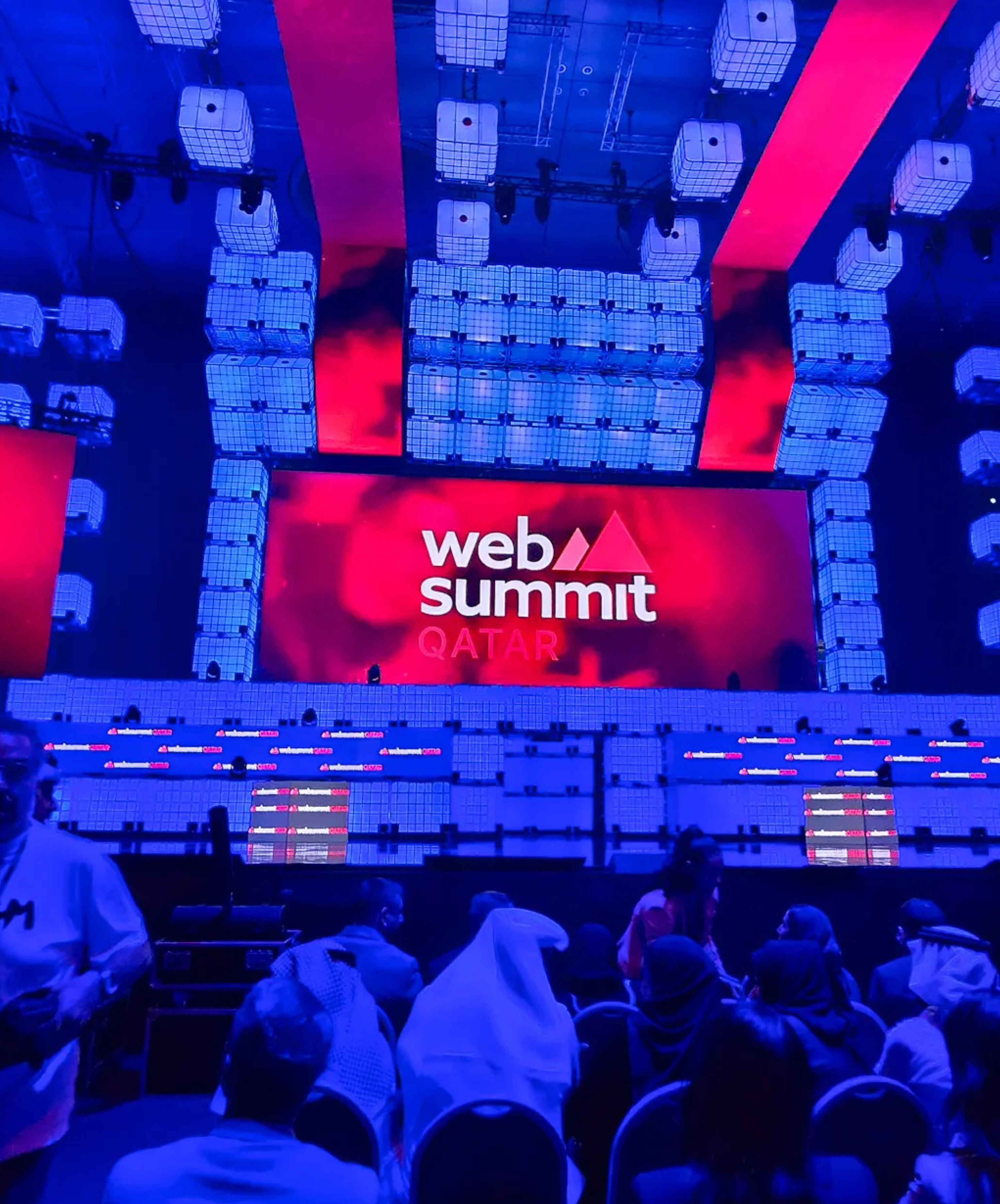 Atteline PR. - Web Summit Qatar 2024 events stage with some attendees