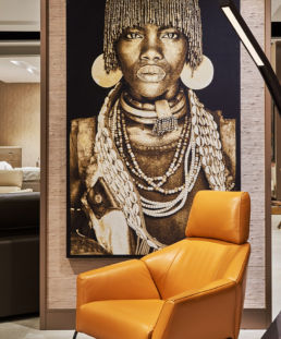 Atteline - Al Huzaifa Interior Design with a yellow chair
