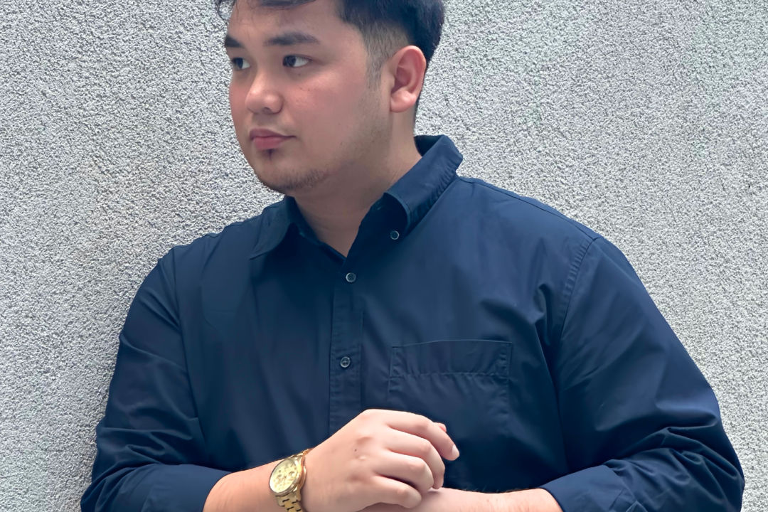 Miko in a blue shirt