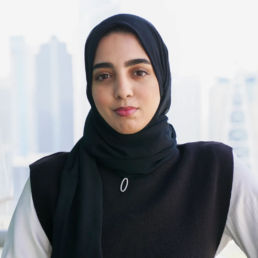 Sarah wearing a hajib on the office terrace