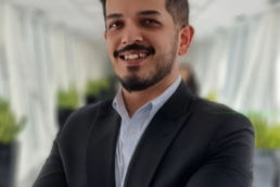 Adnan in a suit