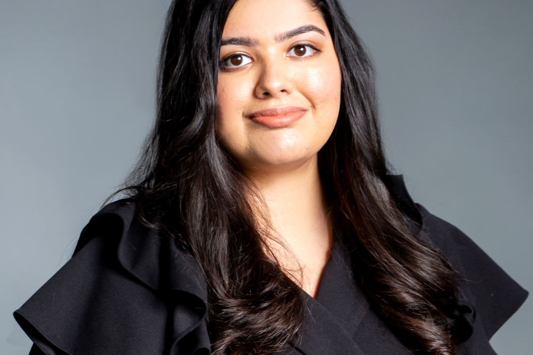 Ruder Finn Atteline Lavina wearing a black dress