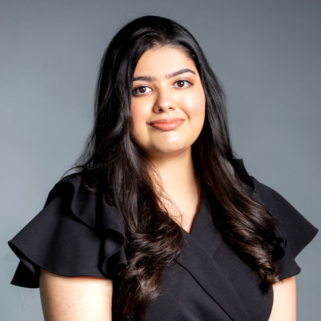 Ruder Finn Atteline Lavina wearing a black dress