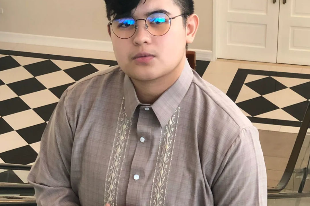 Ruder Finn Atteline Kamil posing infront of the camera