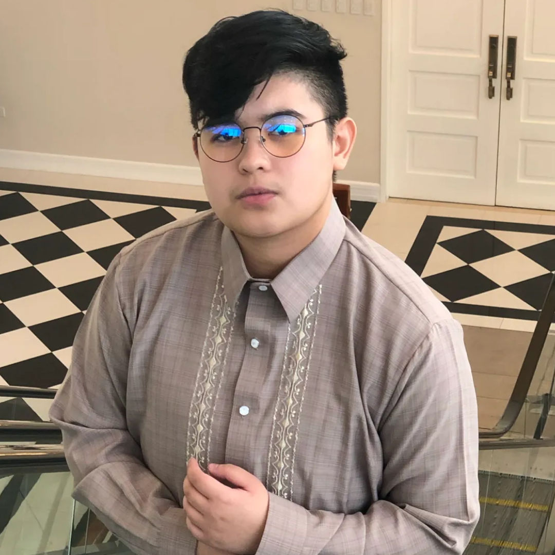 Ruder Finn Atteline Kamil posing infront of the camera