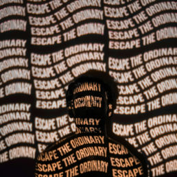 A person with a shadow on his face