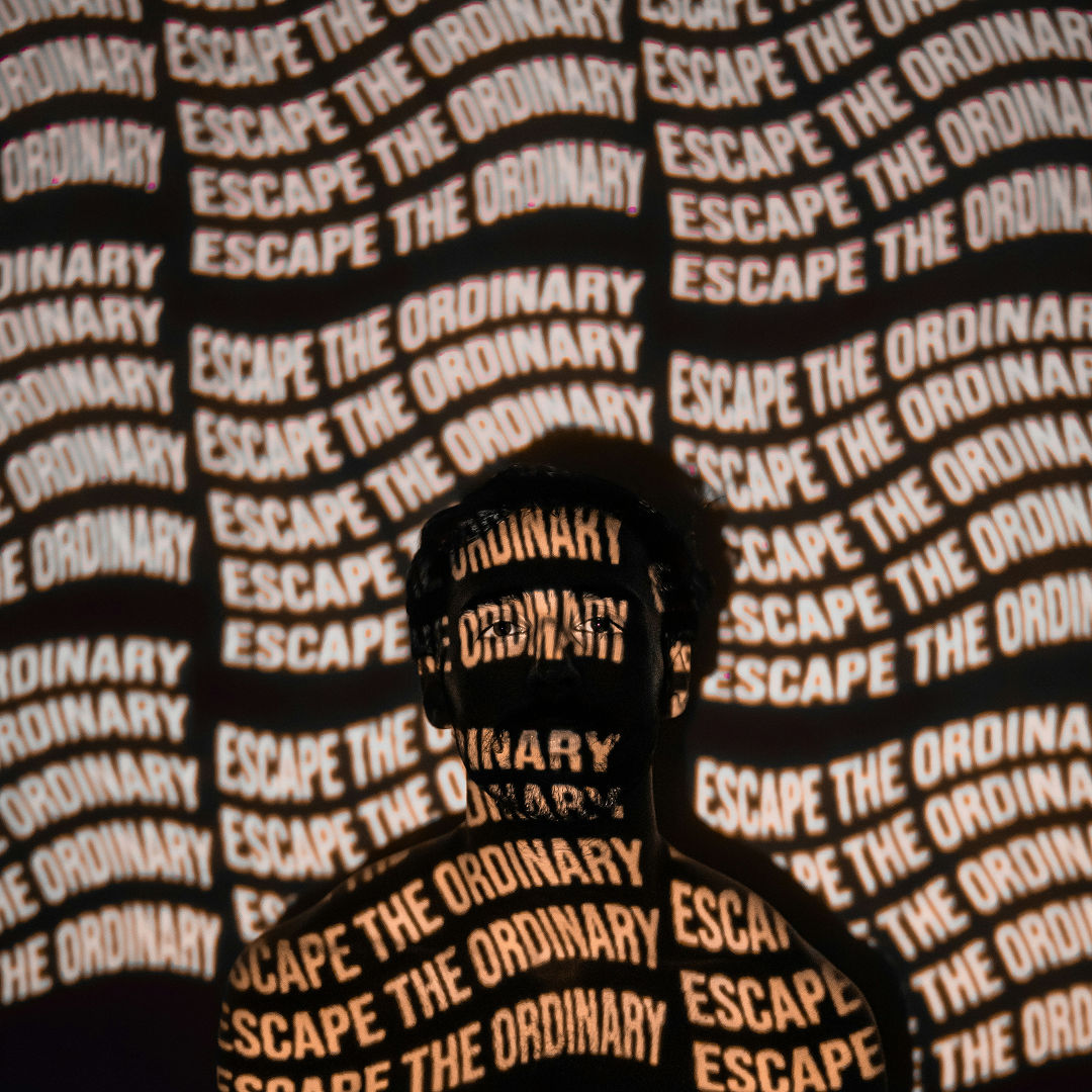 A person with a shadow on his face