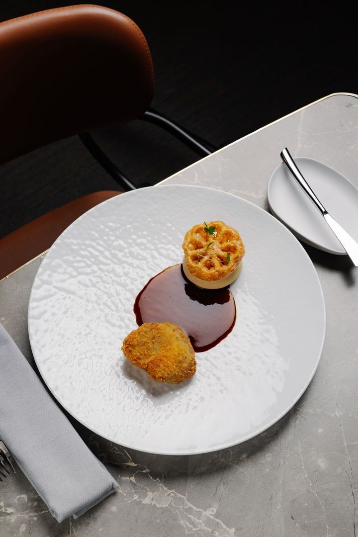 <h2>Menu</h2><p><strong>Smoked Veal Tartare</strong></p><p>Pickled vegetables, mustard, hazelnut, bone marrow, nasturtium, poppy seeds</p><p><br /></p><p><strong>Poached Eel</strong></p><p>Chanterelle mushrooms, green pepper, buckwheat, bacon</p><p><br /></p><p><strong>Vegetarian Oyster</strong></p><p>Aubergine, bryndza cheese, lemon, kimchi</p><p><br /></p><p><strong>Grilled Pike</strong></p><p>Beetroot, horseradish, semolina, begonia</p><p><br /></p><p><strong>Breaded Veal Filet Mignon</strong></p><p>Mushrooms, celeriac, apple, cider, black garlic</p><p><br /></p><p><strong>Pickled Plums</strong></p><p>Granita, Jerusalem artichoke, miso</p>