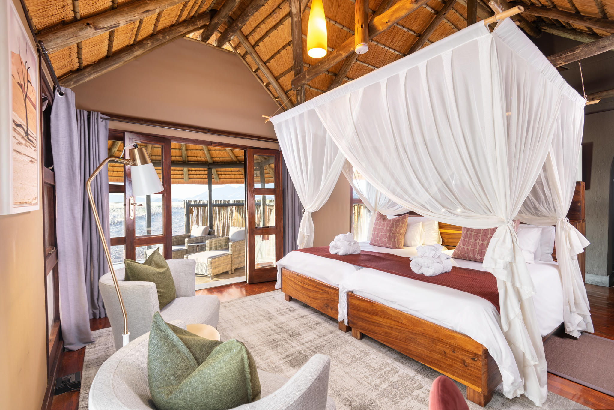 Luxury thatched, partly tented chalets with en-suite Bathrooms (indoor)