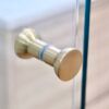 44 SS08 - 10mm Brushed Gold Frameless Shower Screen with Wall Brackets- 1150x850mm