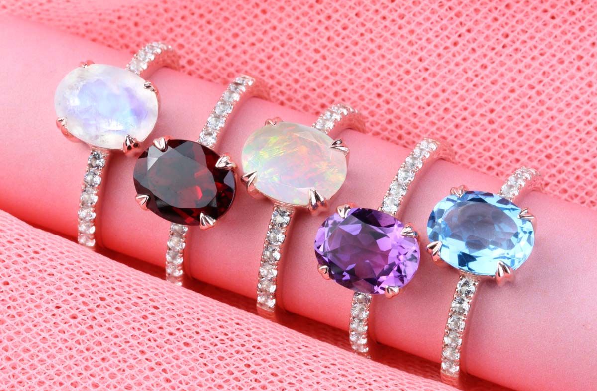 Five oval rings from Aurora Saigon - Blue Topaz, Opal, Amethyst, Garnet, Moonstone