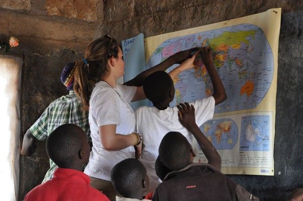 Oakham students fixing desks on school trips to Africa