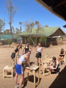 Students building desks