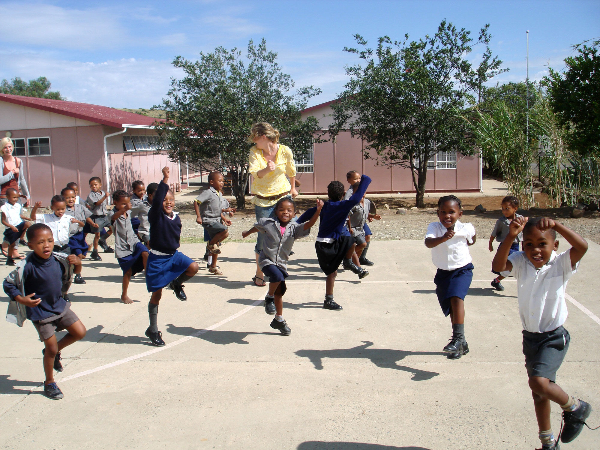 AV volunteer playing with children in South Africa