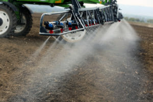 Tractor Spraying Paraquat