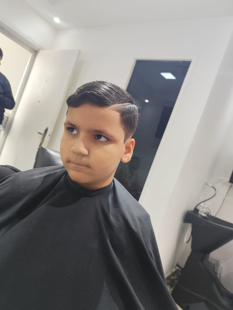 Resultado de corte infantil clássico na tesoura da TURKO Barbershop