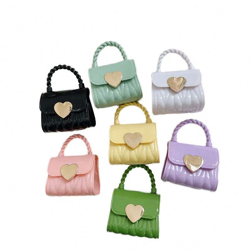 Mini bolsos de PVC impermeables para mujer con cadena unica y cierre de caramelo estilo vintage de PU y silicona